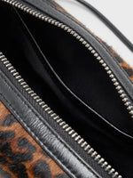 Close-up of black fabric interior and slip pocket