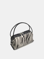 Ivory zebra box bag elevated angled view with zipper