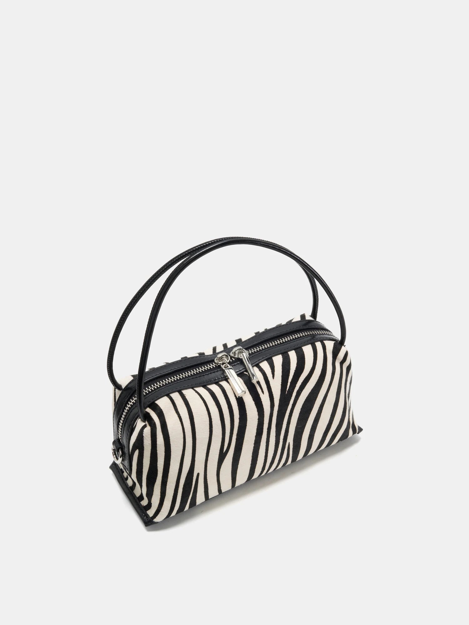 Ivory zebra box bag elevated angled view with zipper