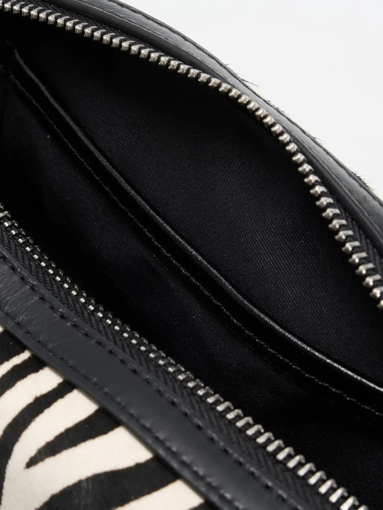 Interior quick-reach slip pocket