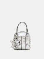 Metallic silver grommet cube bag front view with layered star charms