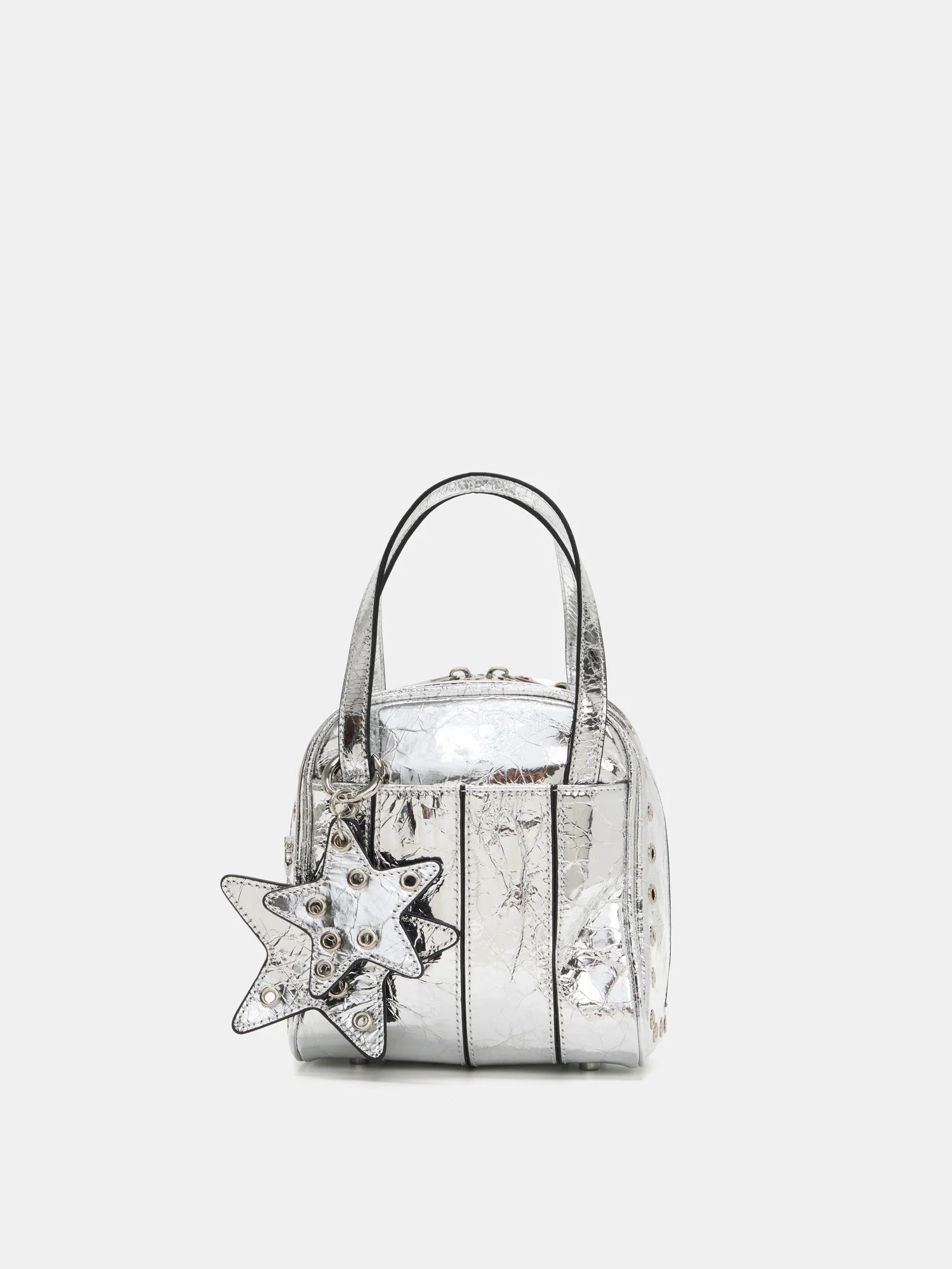 Metallic silver grommet cube bag front view with layered star charms