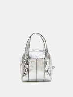 Metallic silver grommet cube bag rear view with vertical leather bands