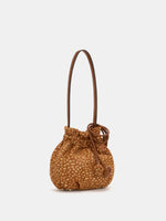 Angled view of fawn-spotted shoulder bag showing its rounded body and gathered top