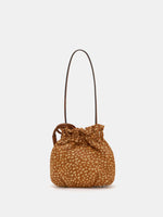 Back view of fawn-spotted shoulder bag with rounded panels and gathered opening