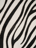 Close-up of black zebra stripes on ivory hair-on hide