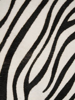 Black and white zebra hair-on hide texture close-up
