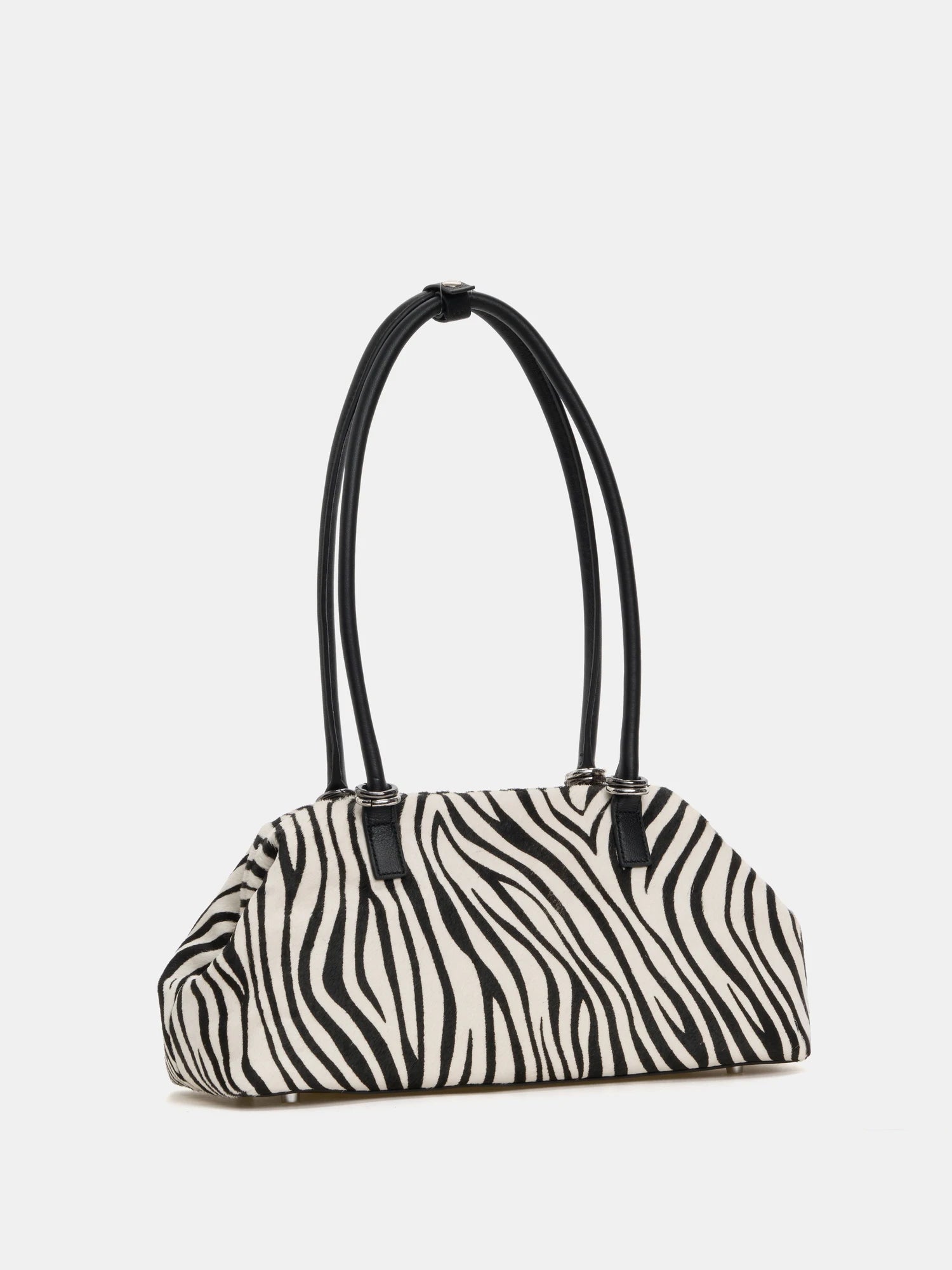 Zebra hair-on frame bag three-quarter front view with long handles