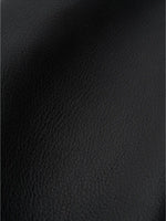 Fine-grain black top-grain cowhide texture close-up
