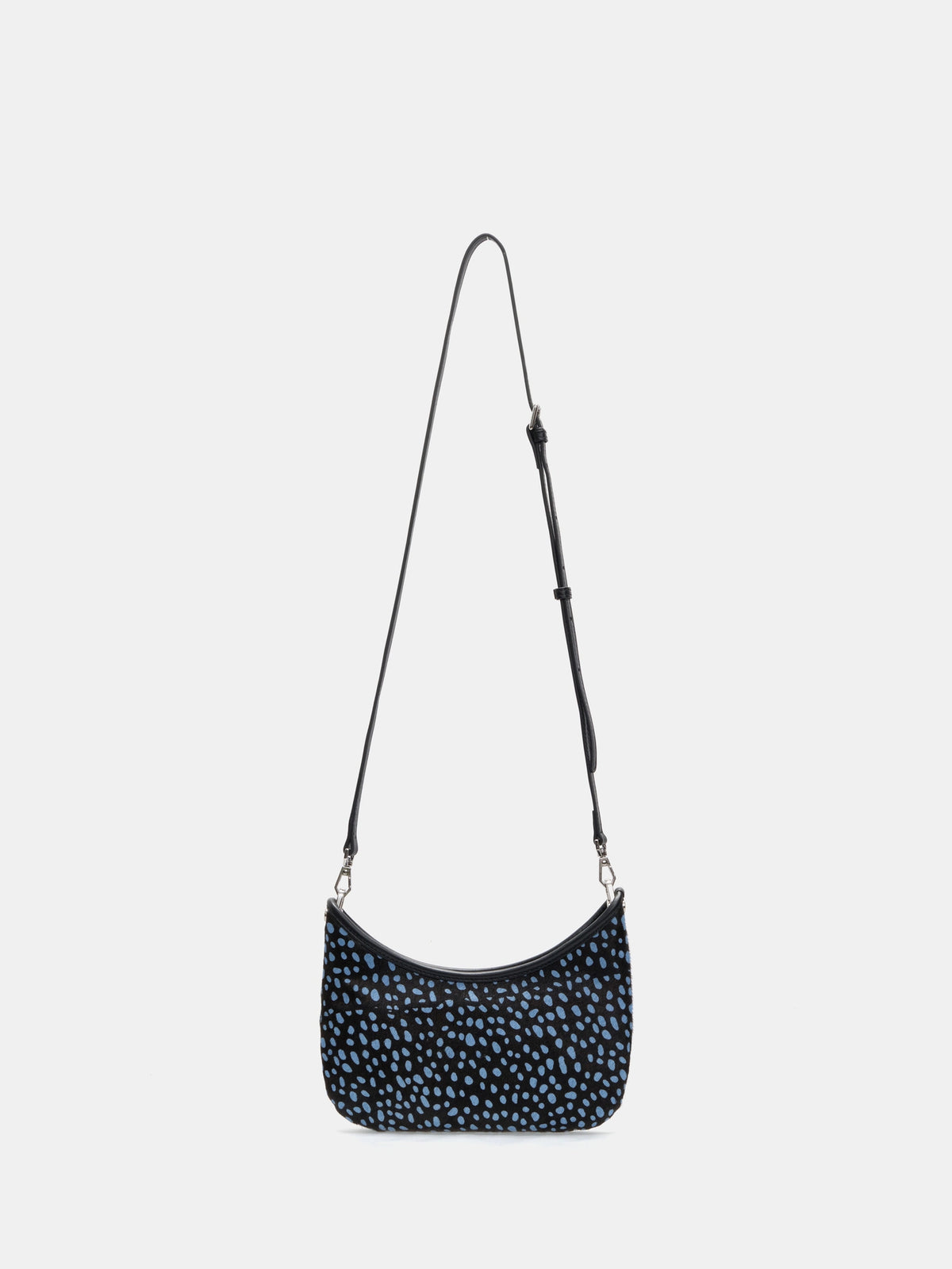 adjustable long strap detail of The Arc Crescent Bag - Blue Dots
