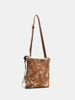 Gilded Caramel bucket bag with adjustable brown leather long strap attached
