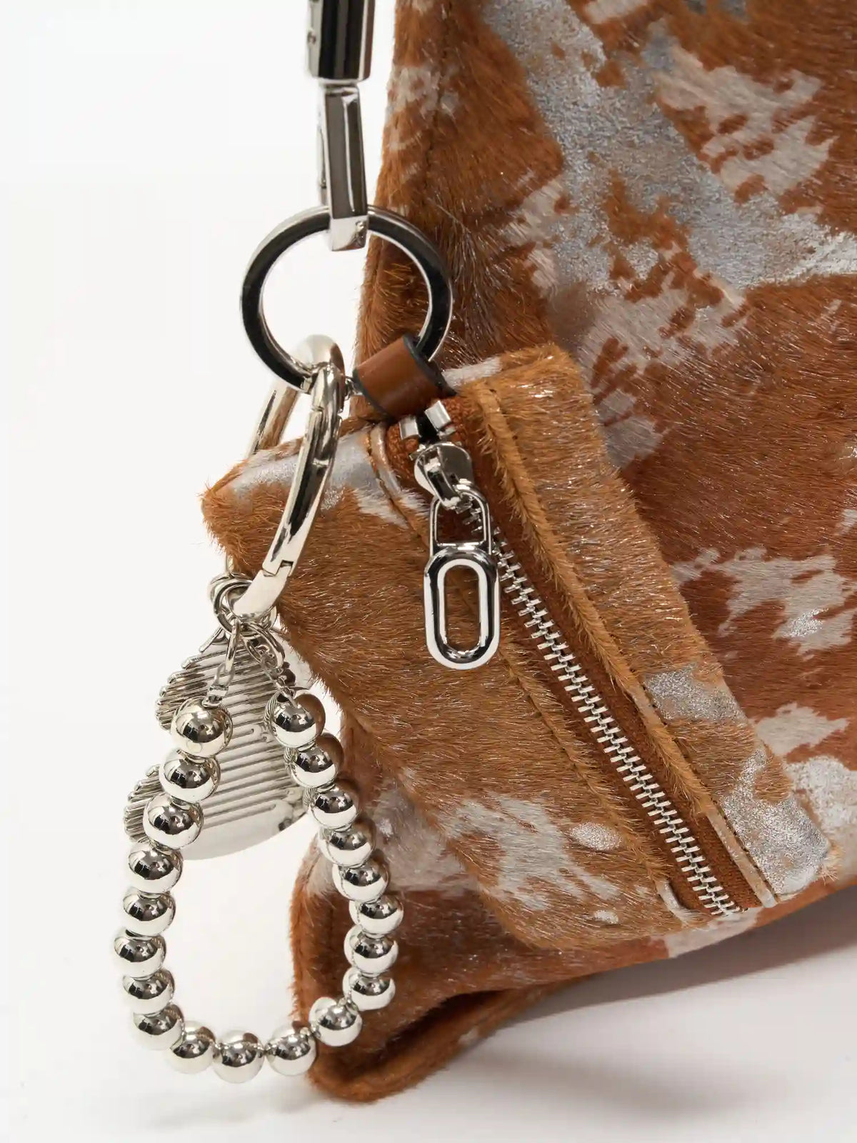 Matching Gilded Caramel zip pouch with silver-tone bead loop and metal accent