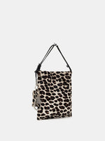 Angled view of Light Beige Leopard bucket bag showing the flat silhouette and matching pouch