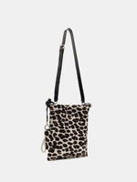 Light Beige Leopard bucket bag with adjustable black leather long strap attached