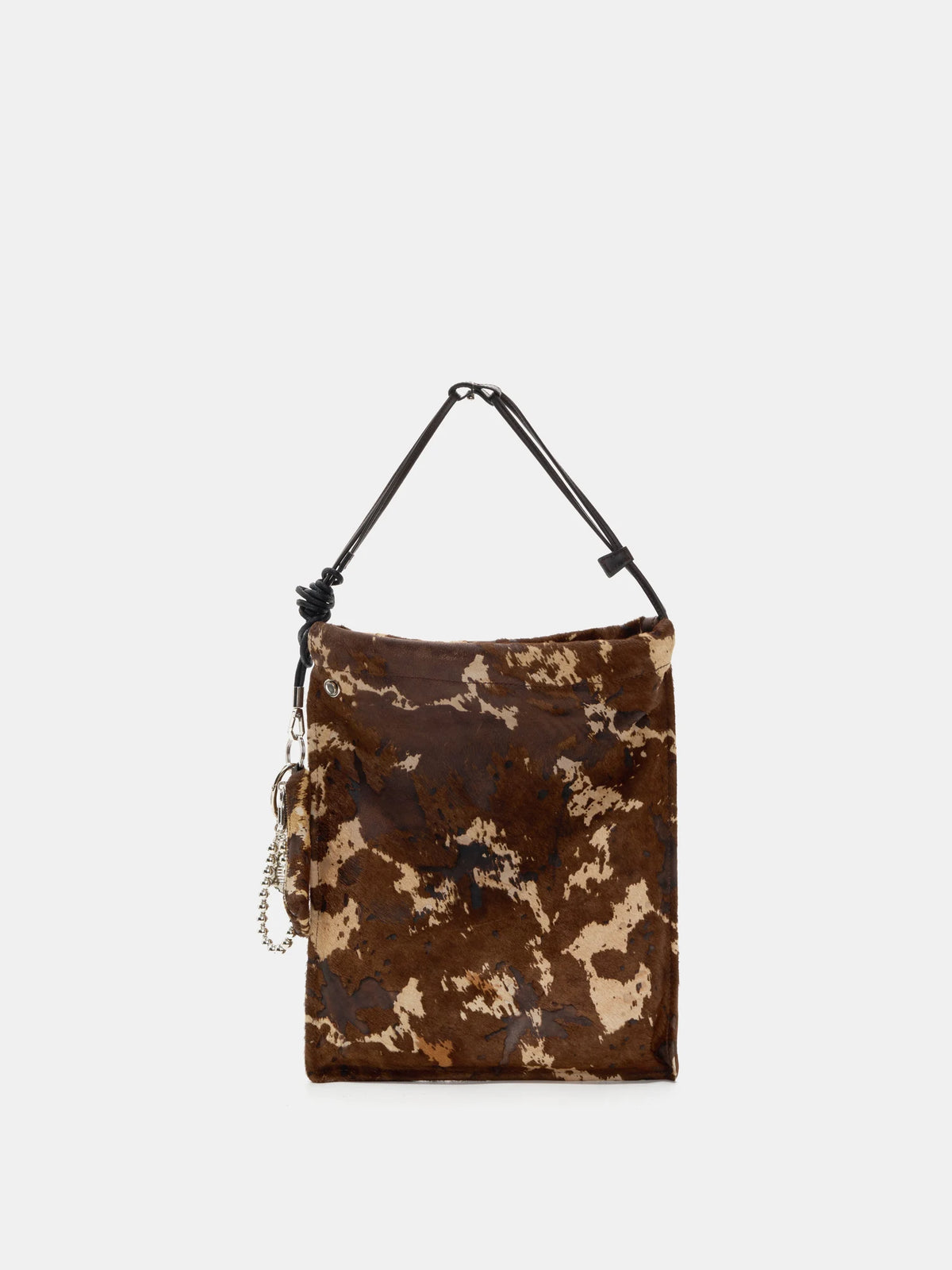 Front view of Mocha Cow Print hair-on bucket bag with short handles and silver-tone accents