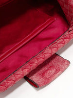 Vintage Rose Weave cowhide chain baguette bag close-up of the interior slip pocket and fabric lining
