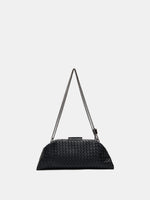 Black Weave handwoven sheepskin chain baguette bag back view showing the long, low silhouette
