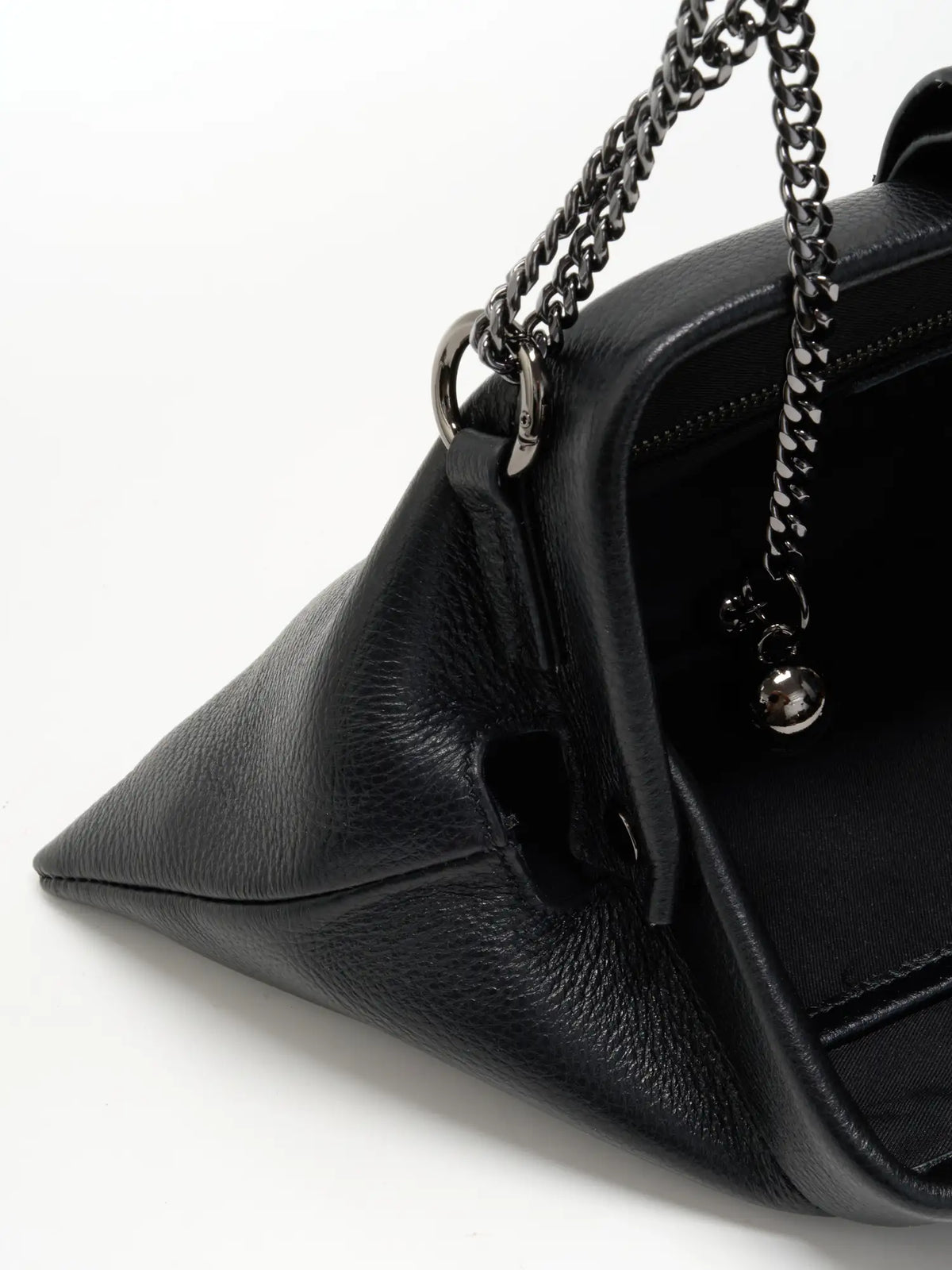 Pebbled Black cowhide chain baguette bag close-up of the chain attachment and spherical ends