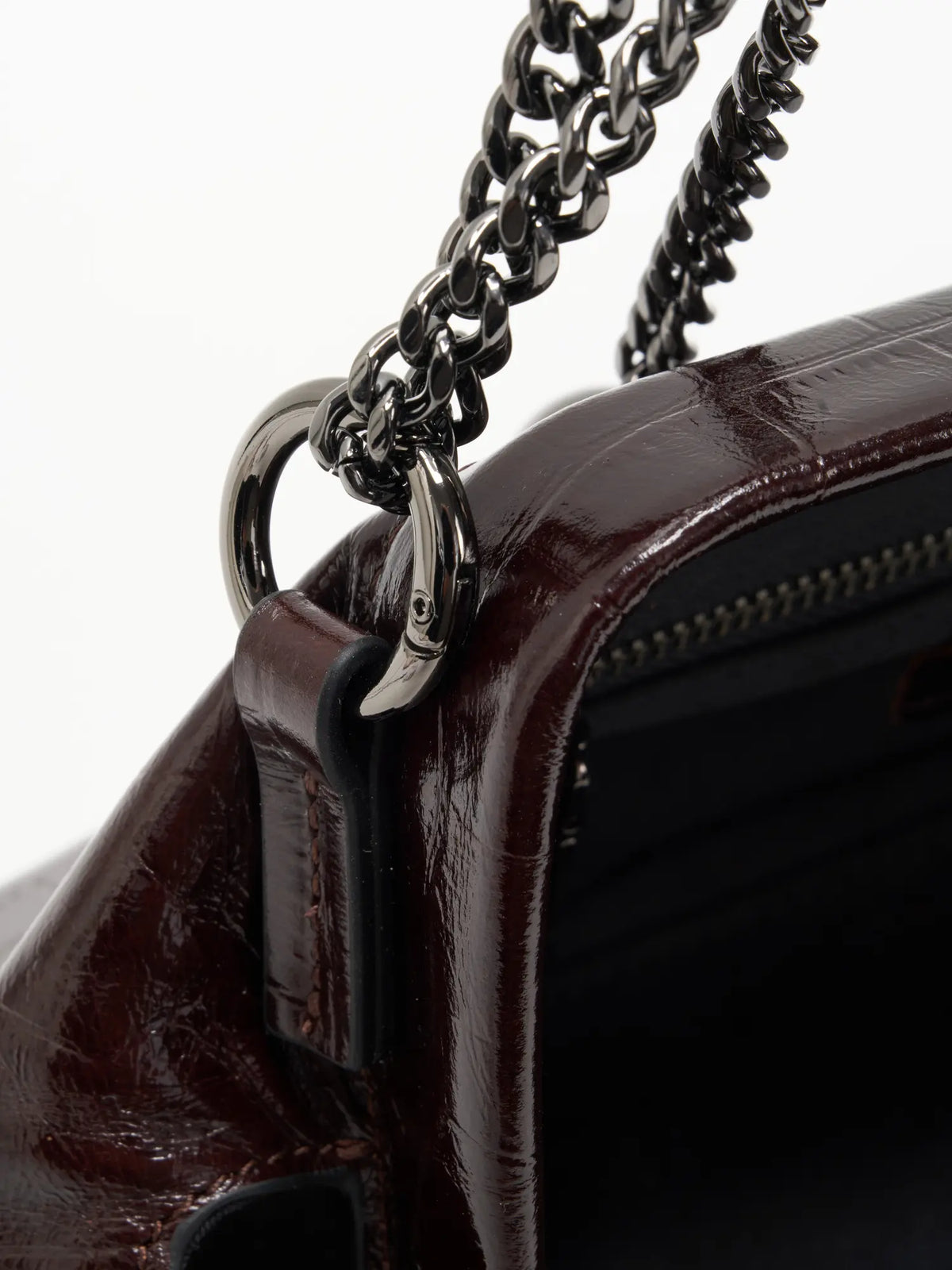 chain and ring detail of The Planet Chain Baguette - Burgundy Croc