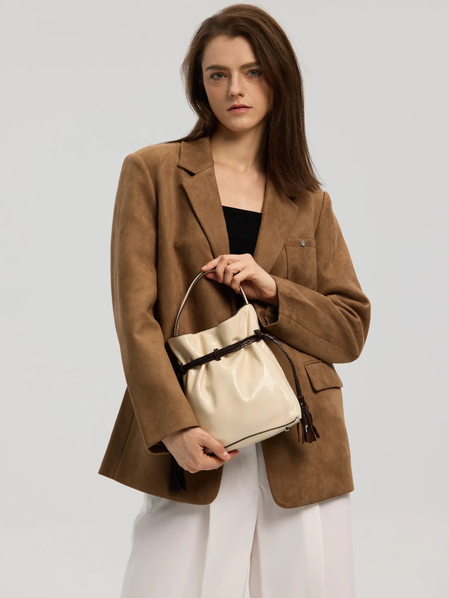 The Serpent Bucket Bag · White Snake